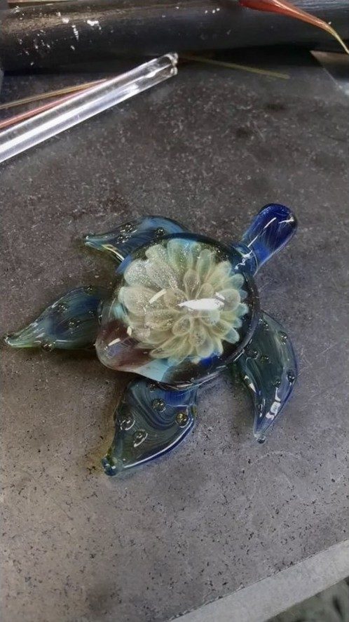 Blue-green borosilicate glass turtle with a flower shell by Jose Valdes