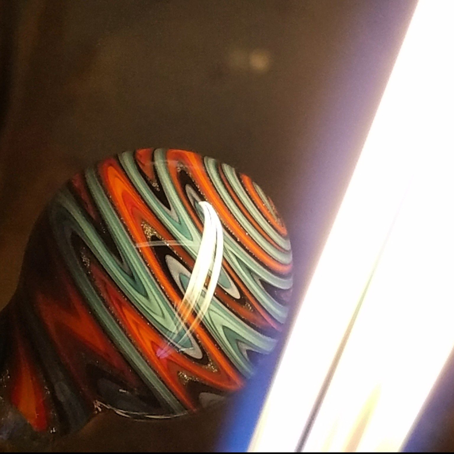 Glass pendant being made by Jose Valdes